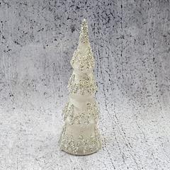 sølvfarvet lille juletræ i glas