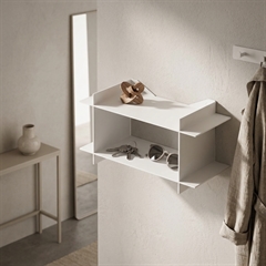 Hvidt væghængt sengebord