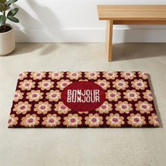 Blomstret dørmåtte i kokosfibre