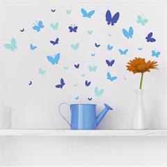 Små wallsticker sommerfugle i blå farver